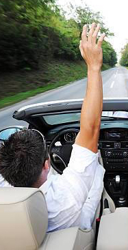 driving with arm raised