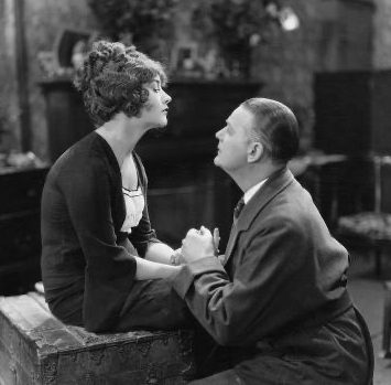 man-pleading-with-unwilling-woman_u-L-Q1BWDYB0